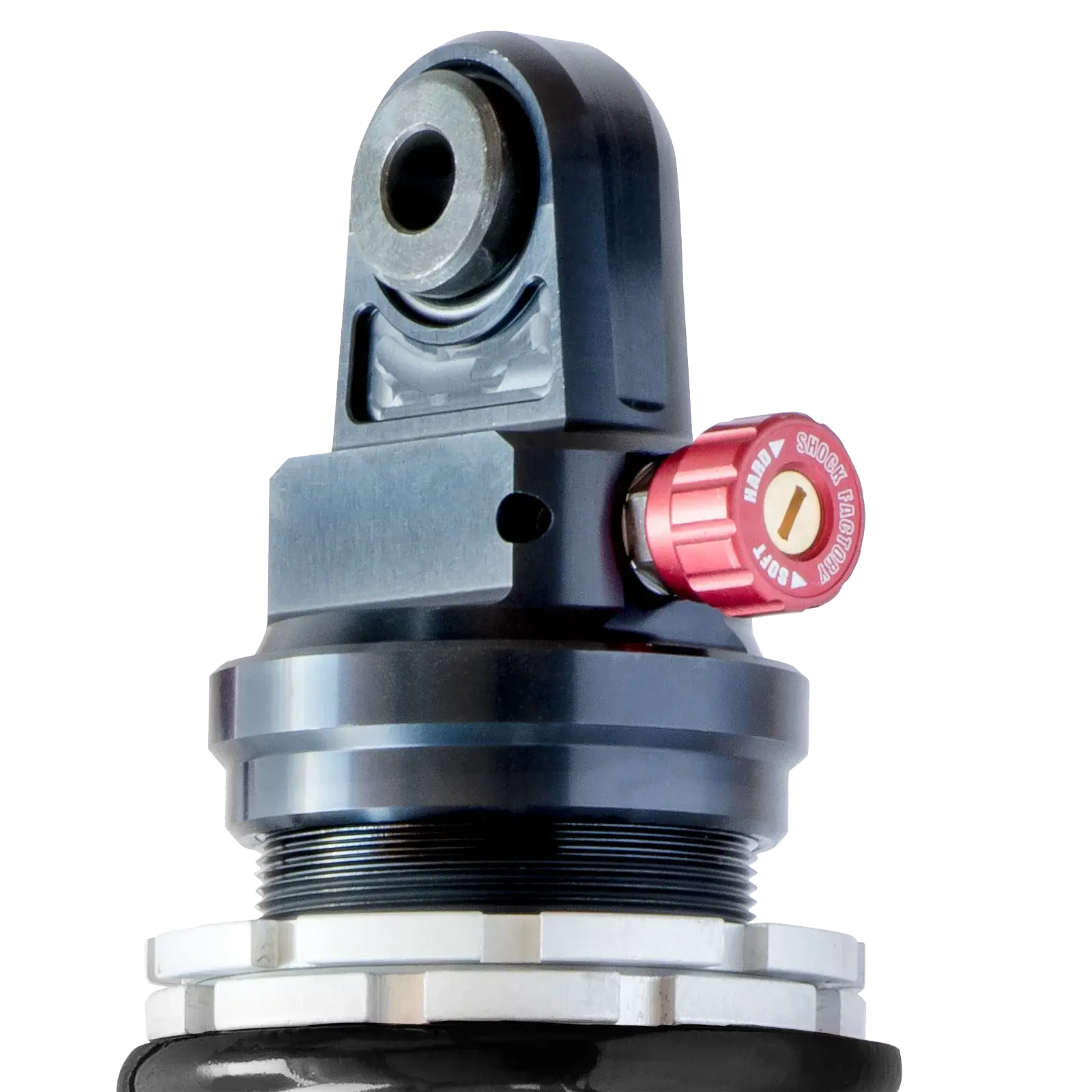 Détail de l’amortisseur M-Shock Shock Factory pour Triumph Scrambler 400X – molette de réglage de détente et compression, finition aluminium anodisé.