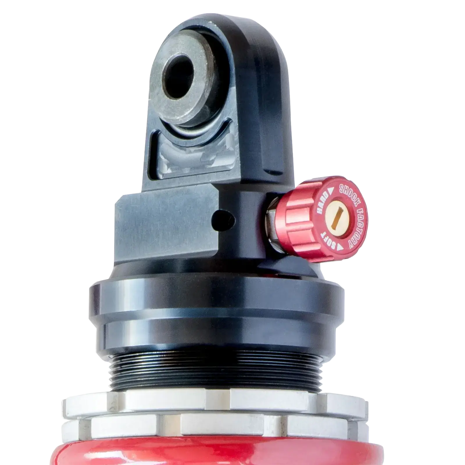 Zoom sur la molette de réglage de l'amortisseur rouge Shock Factory pour moto Triumph