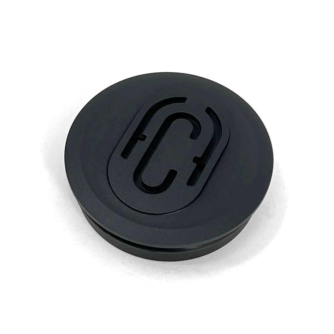 Cache moyeu FCR Accessoires pour BMW NineT et R12 – pièce usinée aluminium anodisé noir, livrée avec axe et visserie.