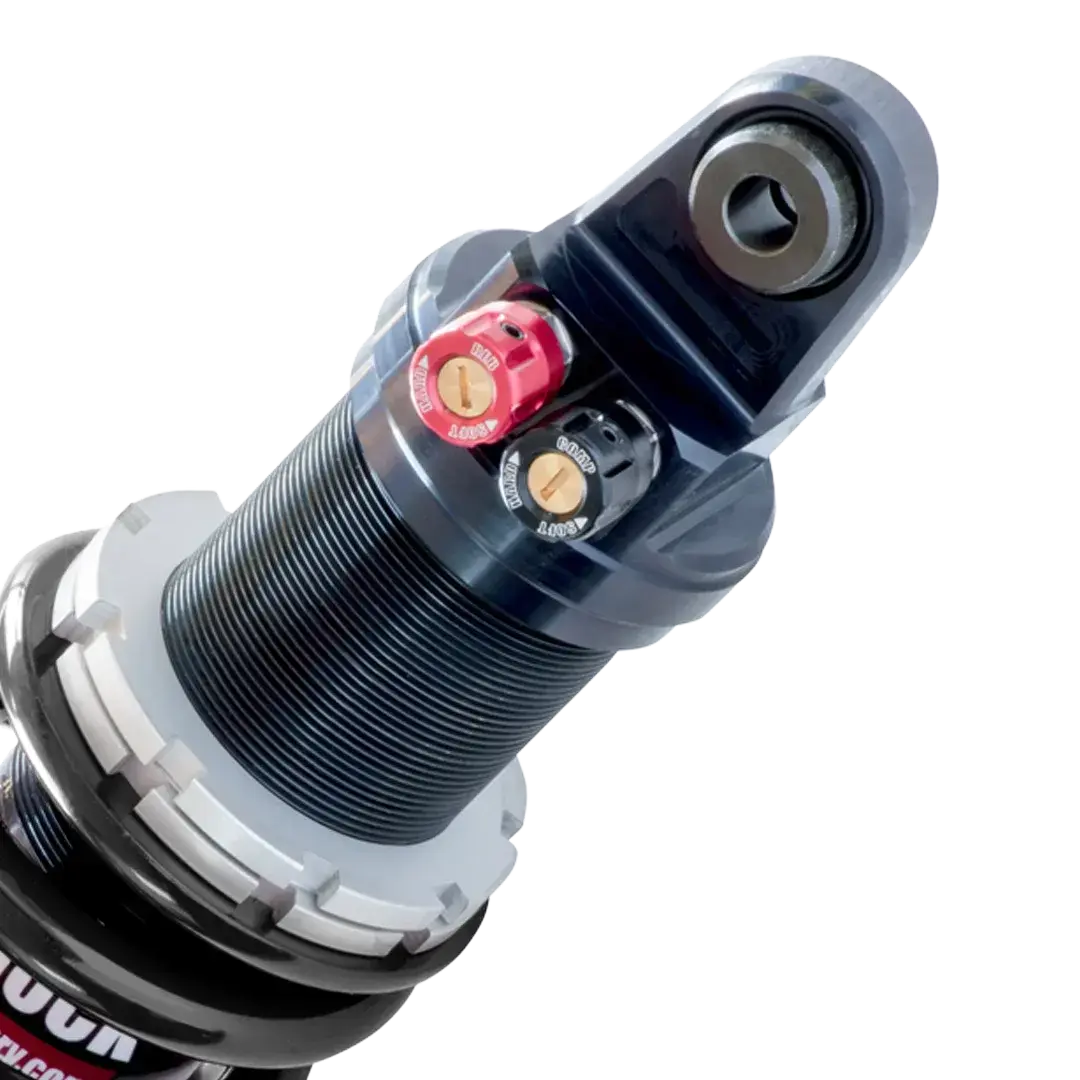 Vue de détail des réglages de l’amortisseur Shock Factory M-Shock 2 noir pour Triumph Rocket 3, molettes séparées de compression et de détente.