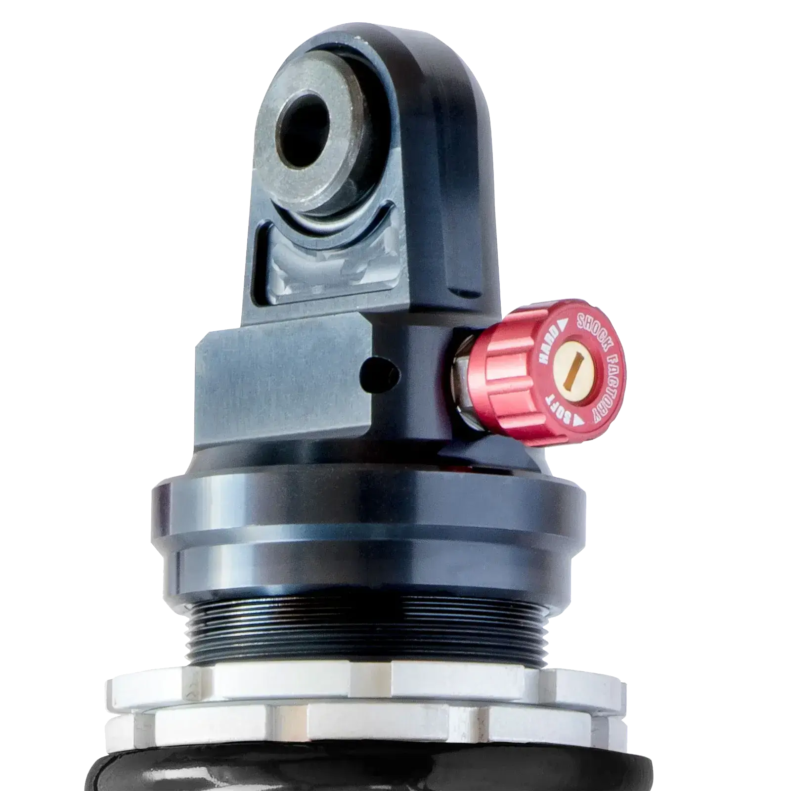 Détail de l’amortisseur M-Shock Shock Factory noir pour Triumph Scrambler 400X  – molette de réglage de détente et compression, finition aluminium anodisé.