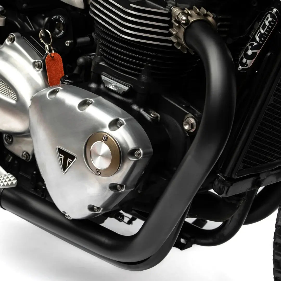 Courbe avant de la ligne d’échappement FCR Accessoires en finition noire pour Triumph Modern Classics, tube noir mat premium.